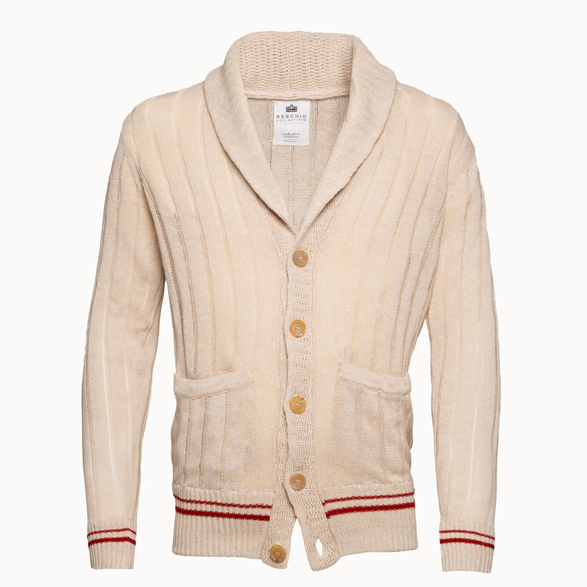 A cream-colored ribbed knit cardigan sweater with a shawl collar, brown buttons, and red stripes on the cuffs and hem, shown against a plain white background.
